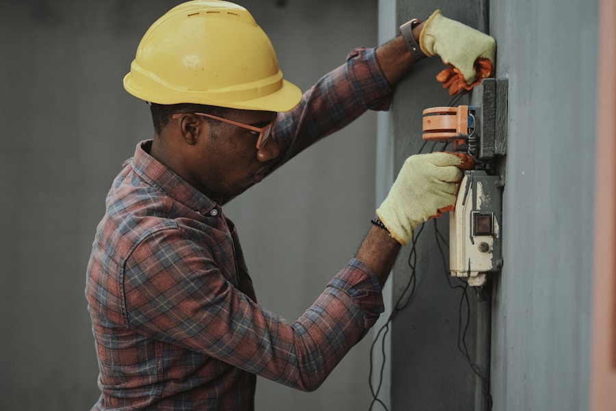 Close-up of a cordless power drill used for fixture installation